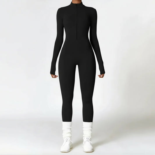 Person wearing a black bodysuit and white shoes on a white background